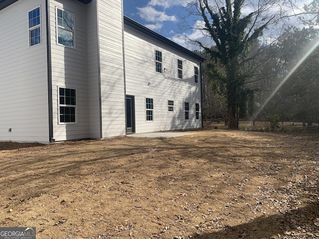 rear view of house with a patio