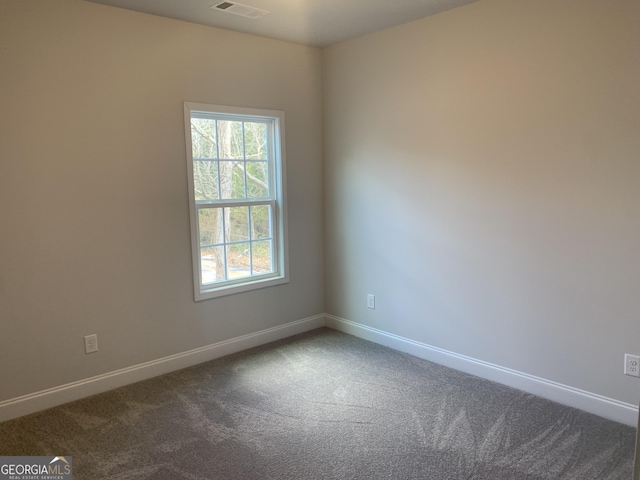 view of carpeted spare room