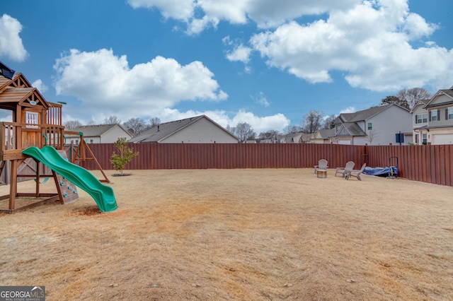 view of yard featuring a playground