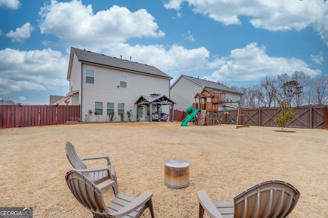 exterior space with a gazebo and a playground