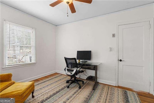 home office featuring ceiling fan and hardwood / wood-style floors