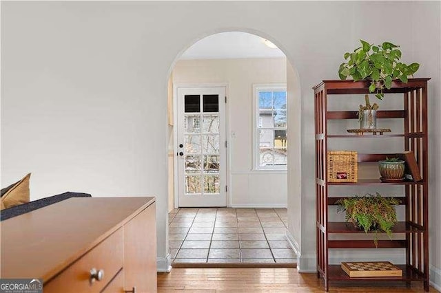 doorway to outside with hardwood / wood-style flooring