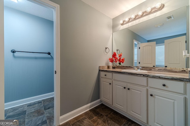 bathroom featuring vanity