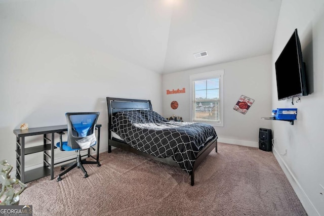 carpeted bedroom featuring vaulted ceiling