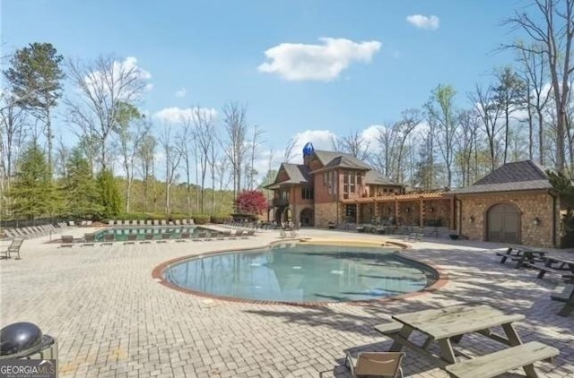 view of pool with a patio area