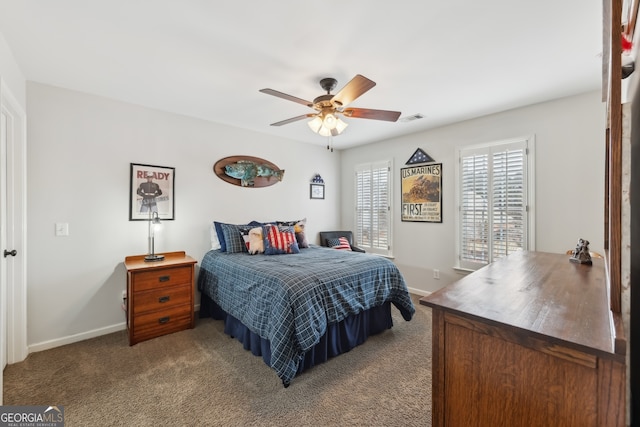 carpeted bedroom with ceiling fan