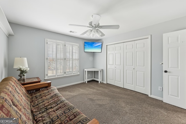 unfurnished room with carpet floors and ceiling fan