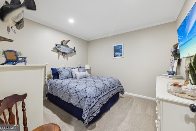 bedroom featuring light carpet and crown molding