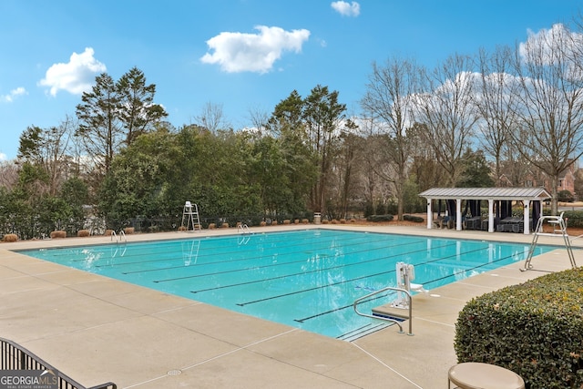 view of swimming pool featuring a patio