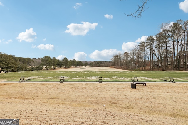 view of home's community featuring a yard