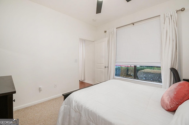 bedroom featuring ceiling fan and carpet flooring