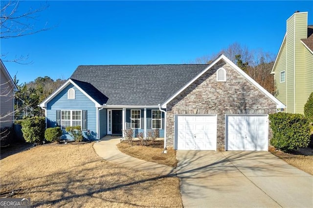 view of front of home with a garage