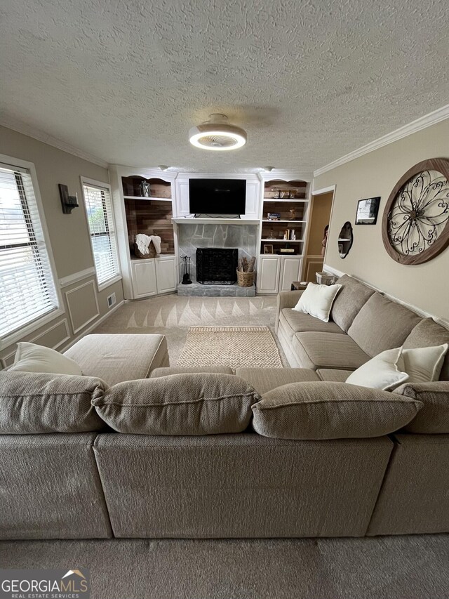 carpeted bedroom with ceiling fan, connected bathroom, sink, and a textured ceiling