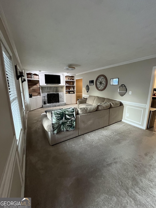 unfurnished living room with ornamental molding and carpet flooring