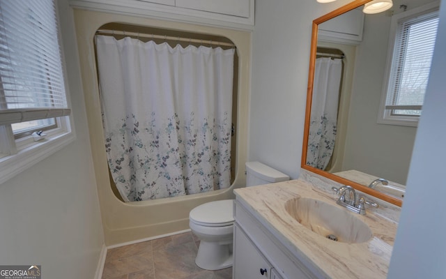 full bathroom featuring toilet, vanity, and shower / bathtub combination with curtain