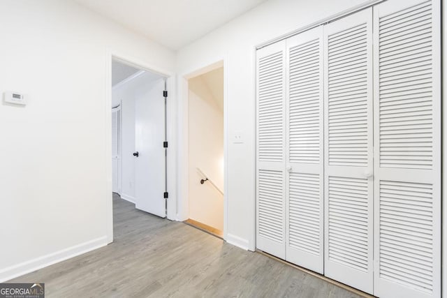 corridor featuring light hardwood / wood-style flooring