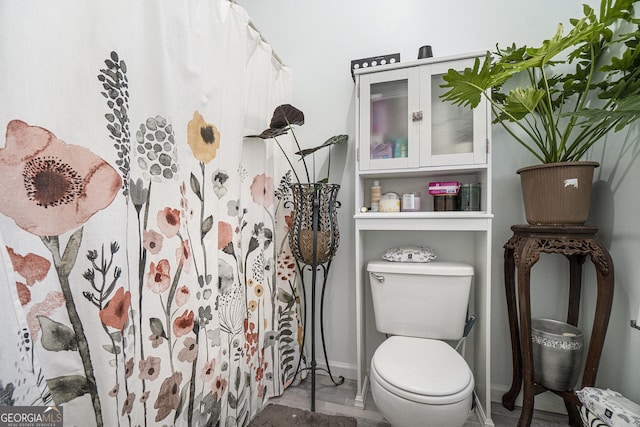 bathroom featuring toilet