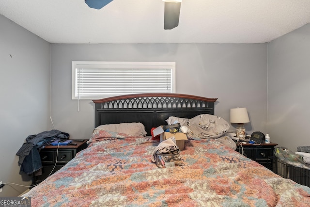 bedroom featuring ceiling fan