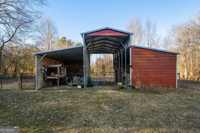 view of outdoor structure with a lawn