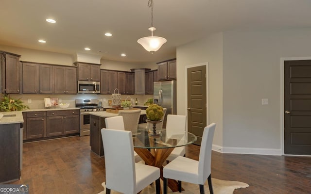 dining room with dark wood-type flooring