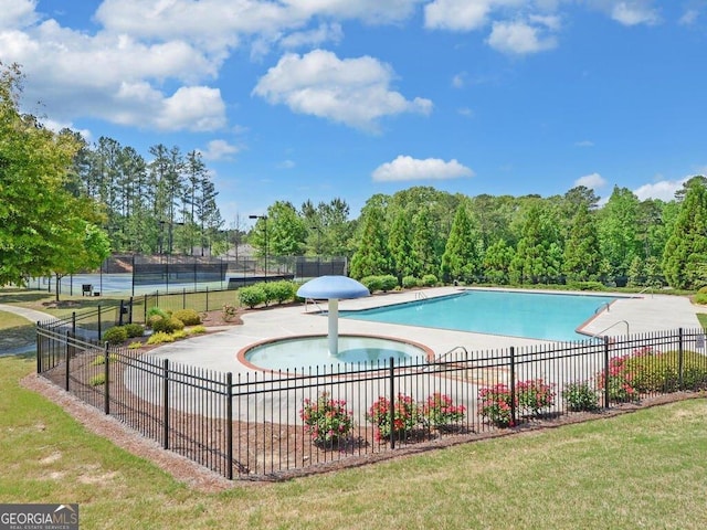 view of pool featuring a patio area