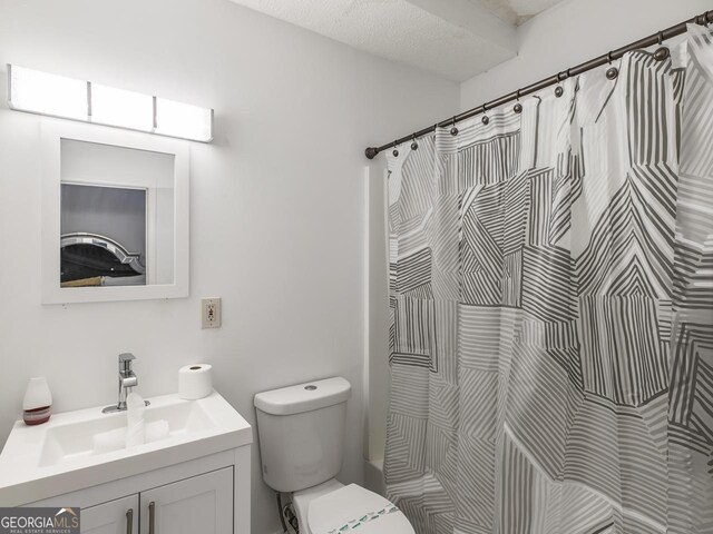 261 Fletcher St SW, Atlanta, GA 30315 - full bath with toilet, vanity, and a shower with shower curtain