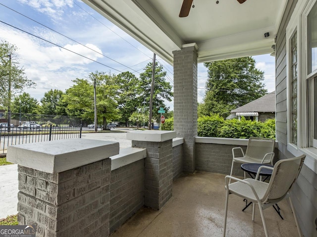 view of patio featuring ceiling fan