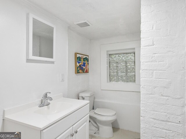 261 Fletcher St SW, Atlanta, GA 30315 - bathroom with vanity, toilet, and tile patterned floors