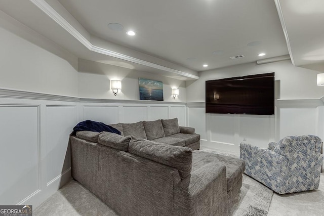 living room featuring crown molding