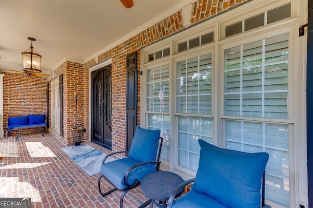 view of patio with ceiling fan