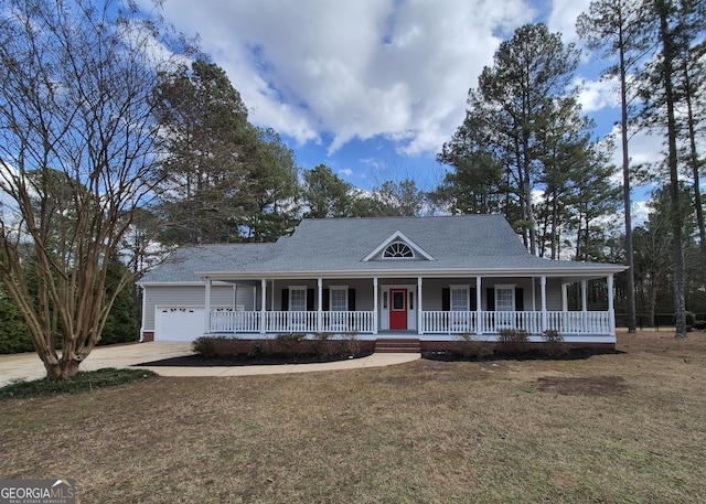 farmhouse with a garage, a porch, and a front lawn