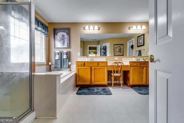 bathroom with vanity, tile patterned floors, and independent shower and bath