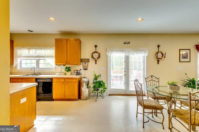 kitchen with sink and black dishwasher