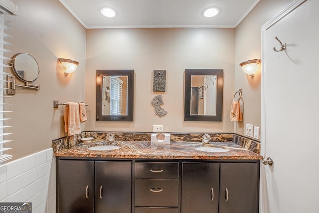 bathroom featuring vanity and crown molding