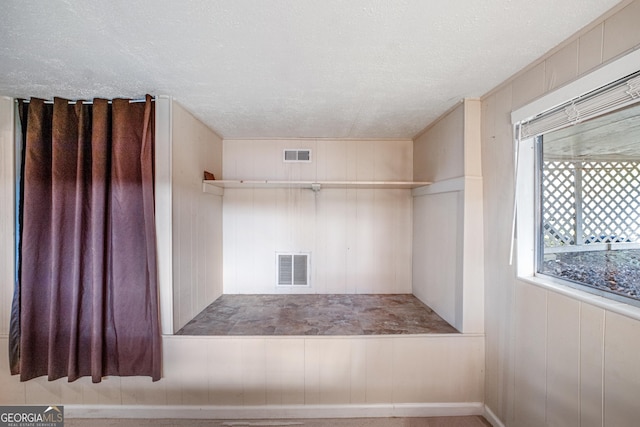 bathroom featuring a textured ceiling