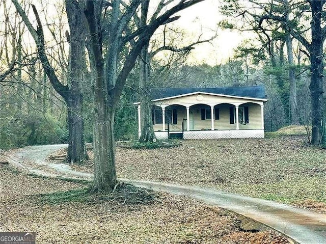 ranch-style home with covered porch