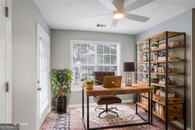 office space featuring ceiling fan