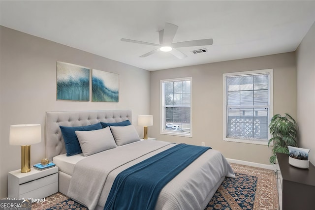 carpeted bedroom with ceiling fan