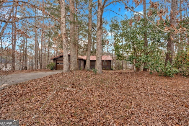 view of front facade with a garage and an outdoor structure