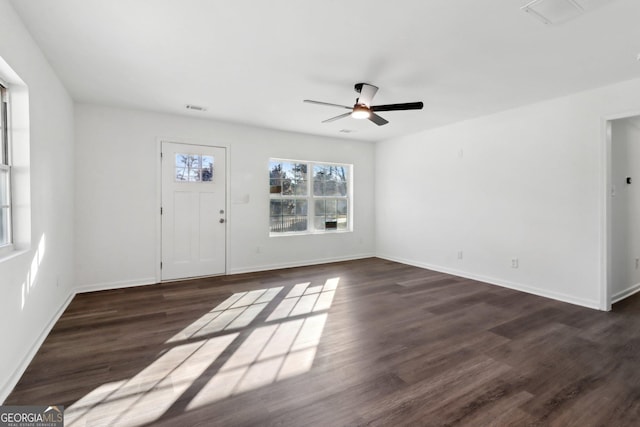 foyer entrance featuring ceiling fan and dark hardwood / wood-style flooring