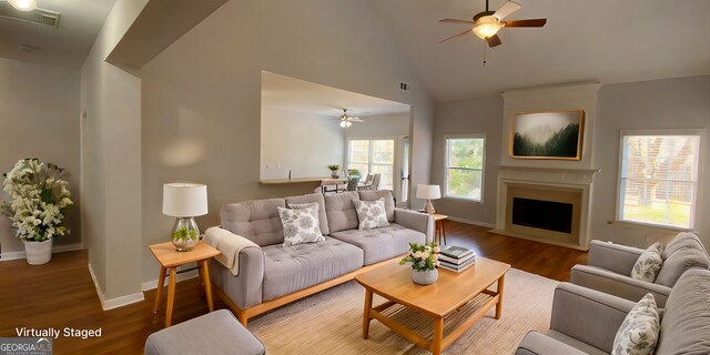 living room featuring sink and dark hardwood / wood-style floors