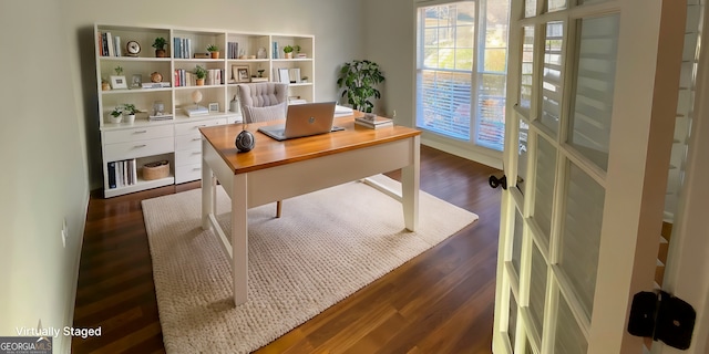 office space with dark wood-type flooring