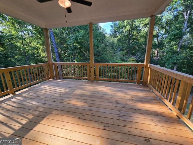 wooden deck with ceiling fan