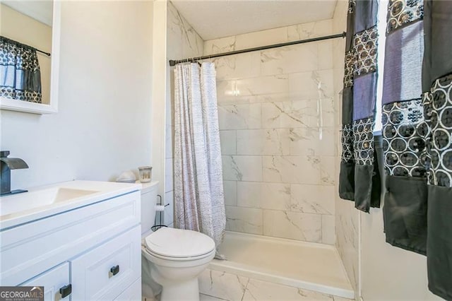 bathroom with vanity, toilet, and a shower with shower curtain