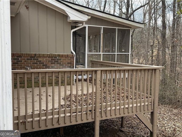 deck featuring a sunroom