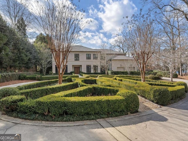 1500 W Wesley Rd NW, Atlanta, GA 30327 - colonial inspired home featuring stucco siding