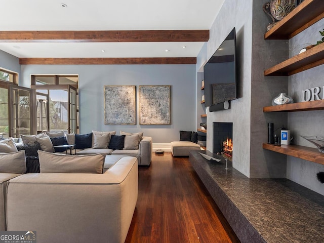 1500 W Wesley Rd NW, Atlanta, GA 30327 - living area with beamed ceiling, a warm lit fireplace, and dark wood finished floors