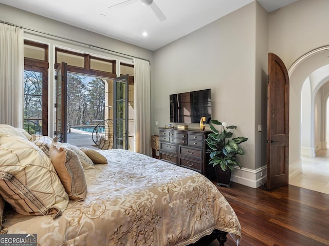 1500 W Wesley Rd NW, Atlanta, GA 30327 - bedroom with access to outside, arched walkways, a ceiling fan, baseboards, and wood finished floors