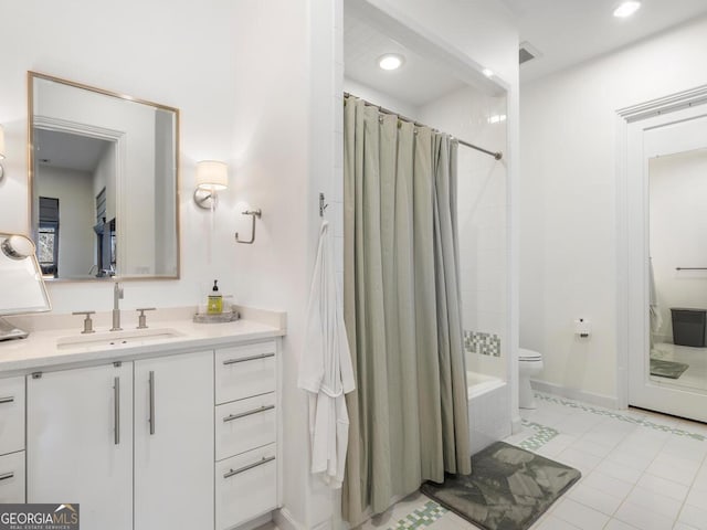 1500 W Wesley Rd NW, Atlanta, GA 30327 - bathroom featuring vanity, toilet, tile patterned floors, shower / bath combo with shower curtain, and recessed lighting