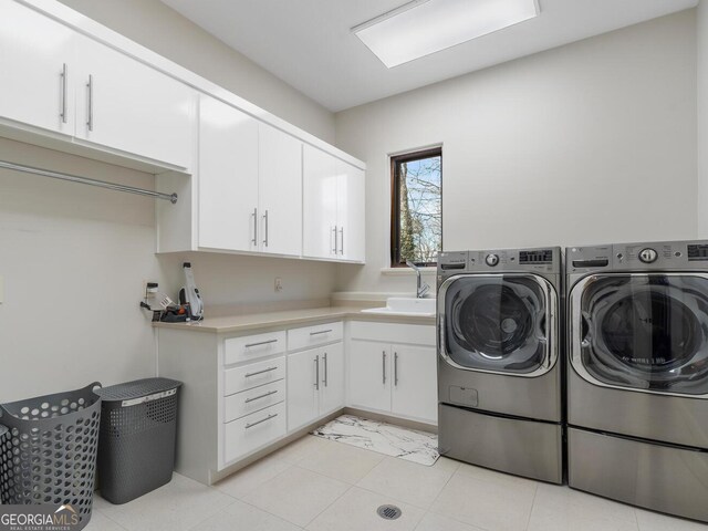 1500 W Wesley Rd NW, Atlanta, GA 30327 - laundry area with washer and dryer, a sink, and cabinet space
